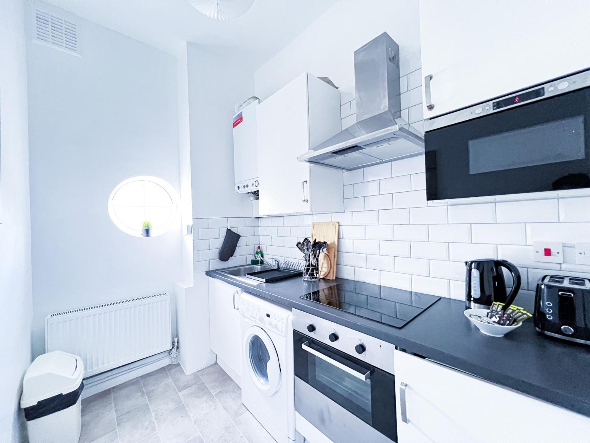 Cosy Camden - On 1st Floor Апартаменты Лондон